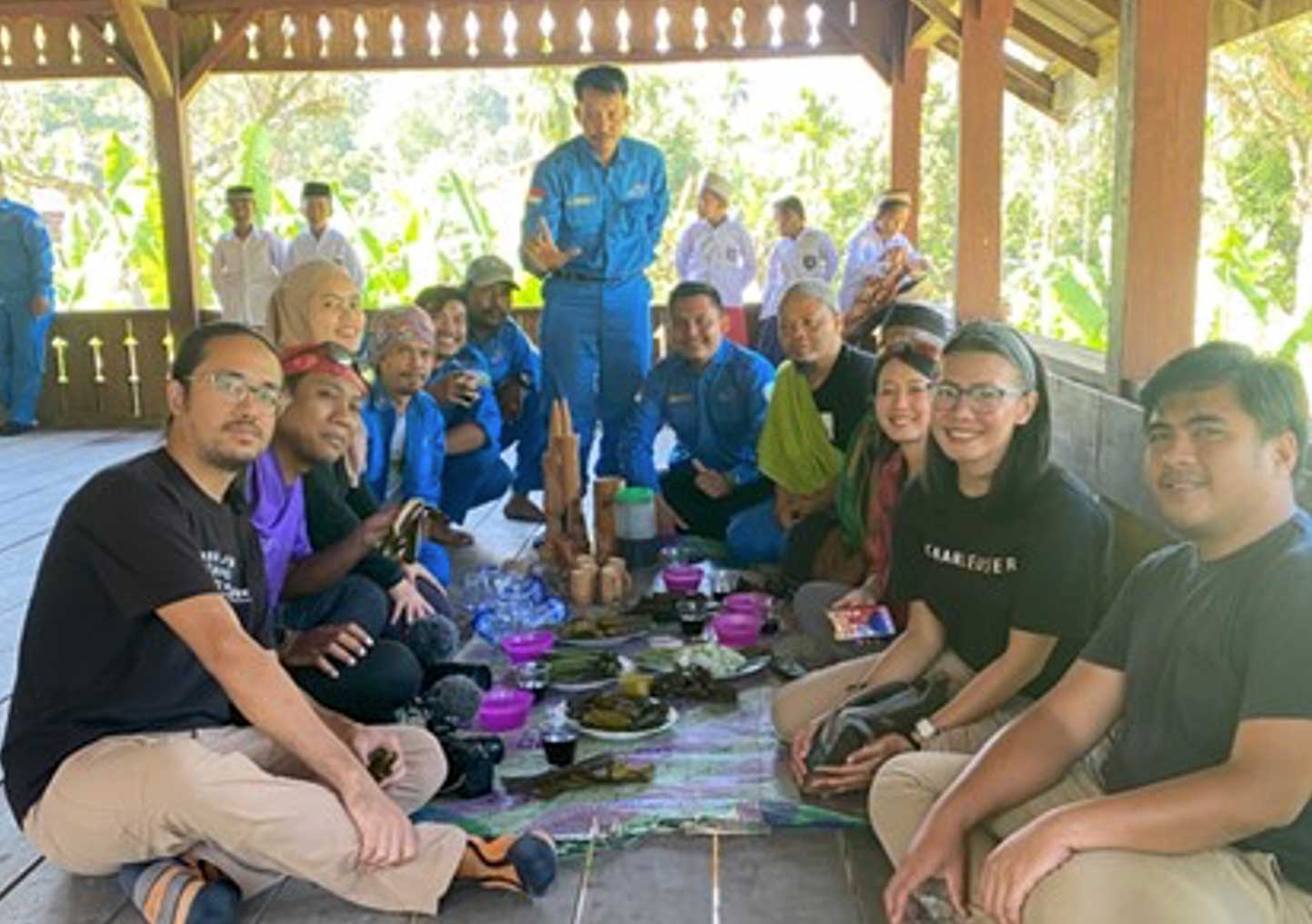 Abex (second right) and Uki Wardoyo (third right) of Indonesia, with the rest of the production crew and staff of Gunung Leuser National Park
